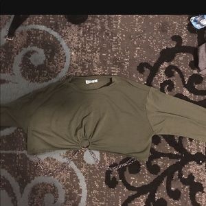 A long sleeve cropped top with chains